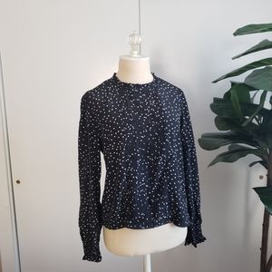 Black and white polka dot blouse